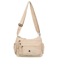 Miejska torebka damska w beżowym kolorze  - Peterson